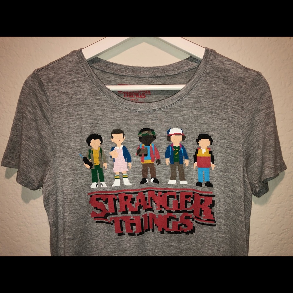Stranger Things Pixelated Acid-Wash Tee.   3.